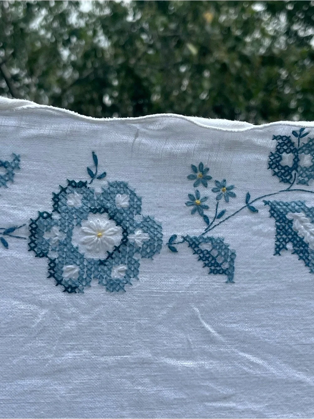 Embroidered White Linen tablecloth with blue flowers Motif